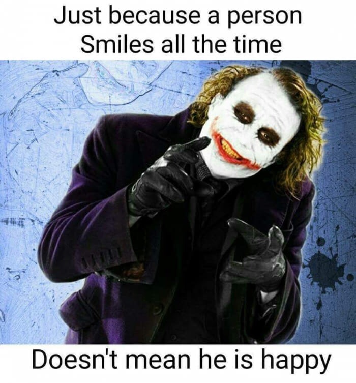 Axiom quote about "Just Because a person is smiling, doesn't mean they are happy" over the picture of the Joker from Batman.
