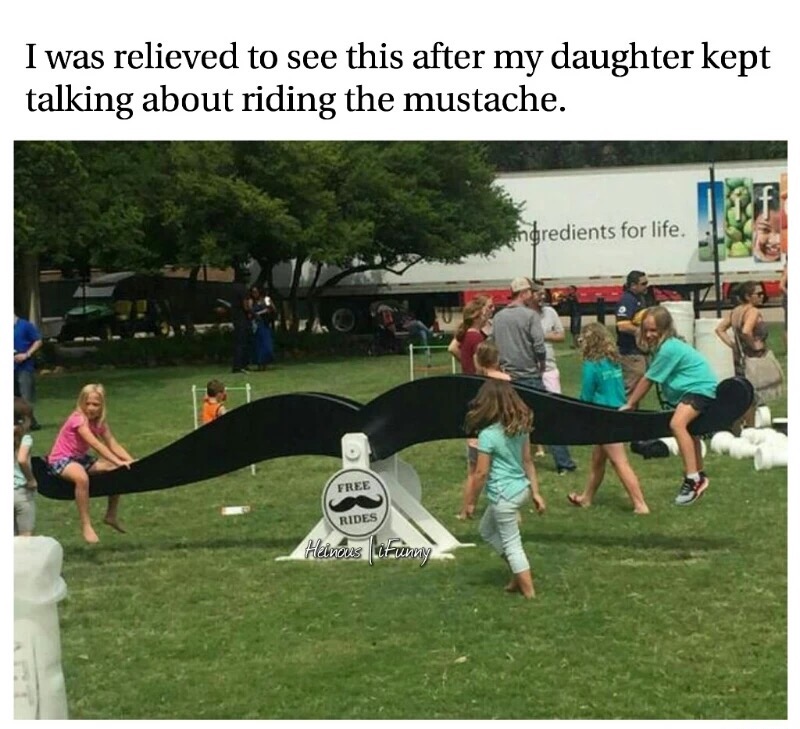 Man was relieved when his daughter wanted to ride the mustache was just a see-saw ride in the park.