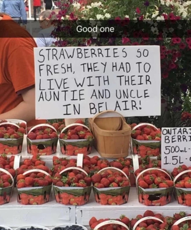 Snapchat of a sign selling strawberries saying they are so fresh that they had to live with their Aunt and Uncle in Bel Air
