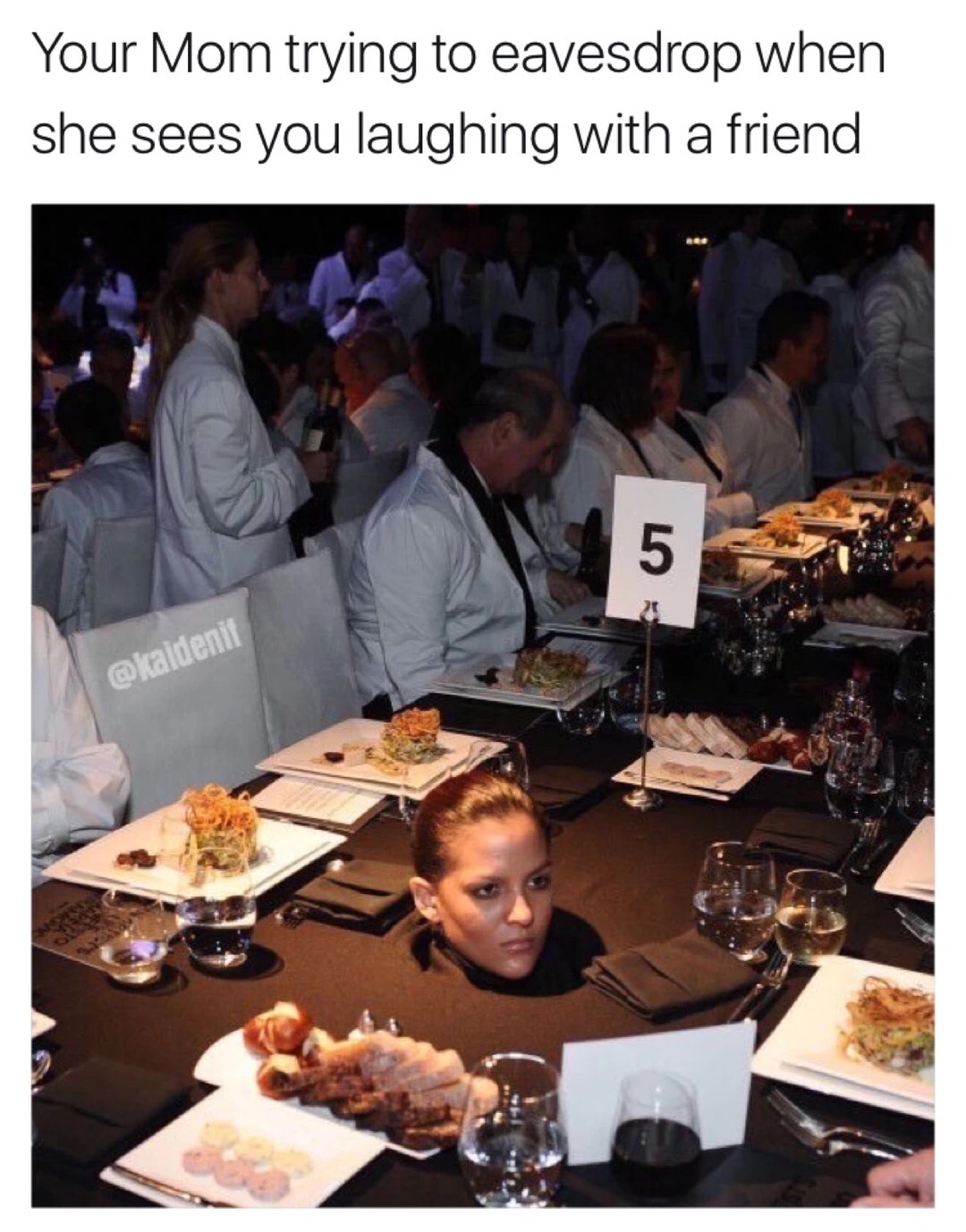 Funny meme about pic of a woman sticking her head out in the table cloth