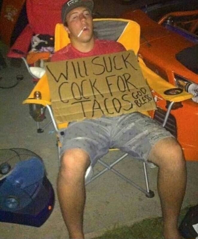 Man passed out on lawn chair with sign that he will do anything for Tacos.