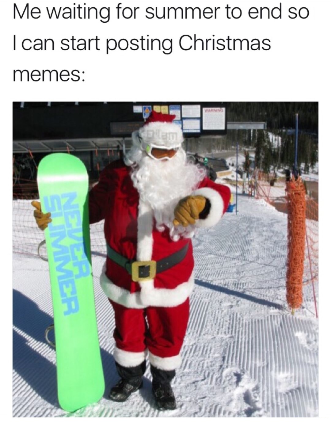 Santa Clause with a Snowboard looking at his watch, captioned as meme that Christmas memes start right after summer vacation