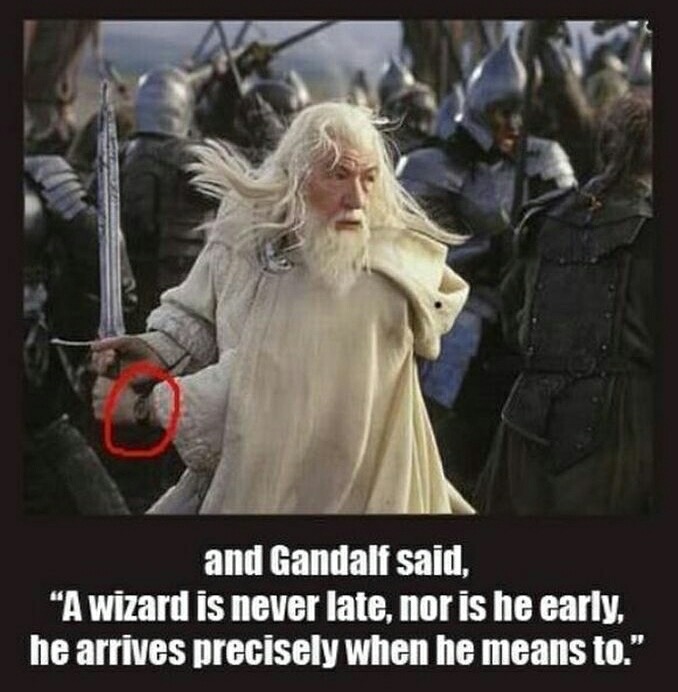 Gandalf fighting and is wearing a watch so he is always on time.