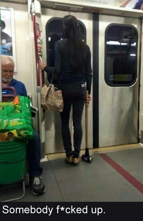 Dank meme of woman on the subway carrying a sledge hammer.