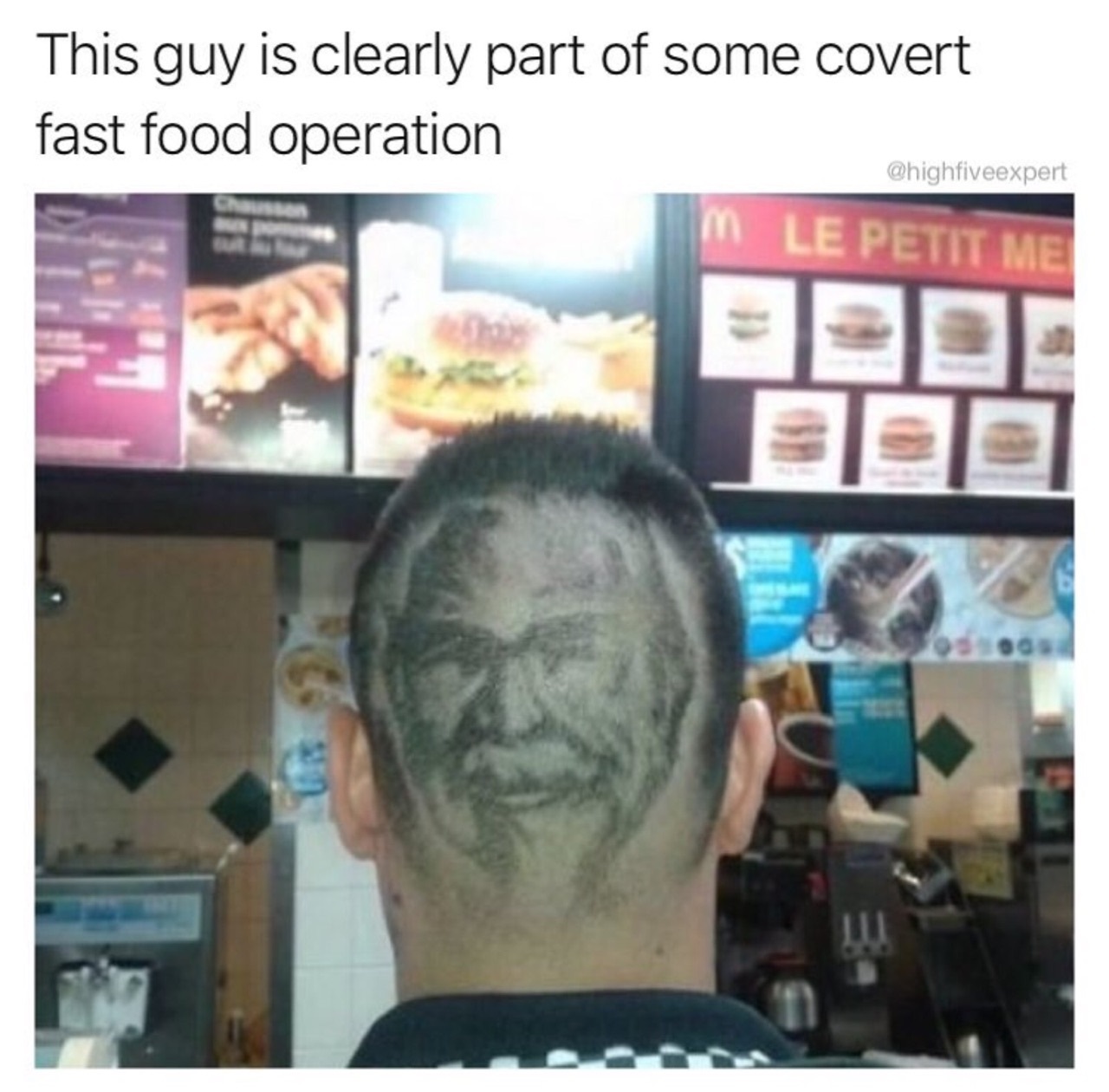 Man with General Sanders on the back of his head while ordering take out