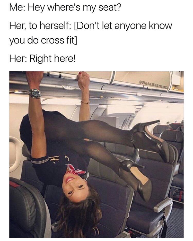 Flight attendant doing crossfit to let you know where your seat is.
