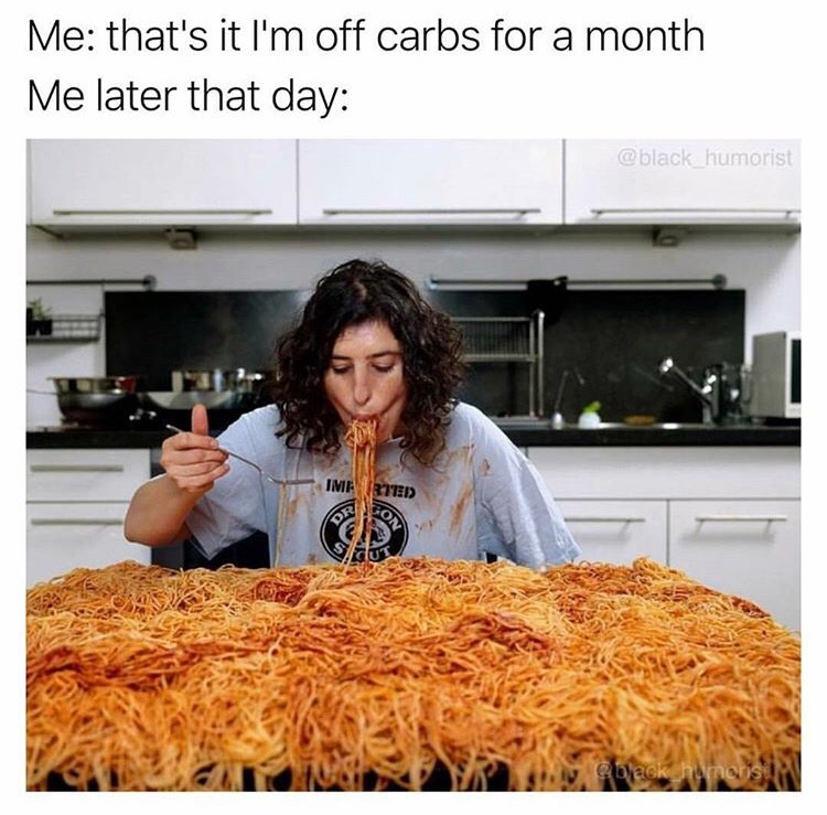 Girl eating lots of spaghetti
