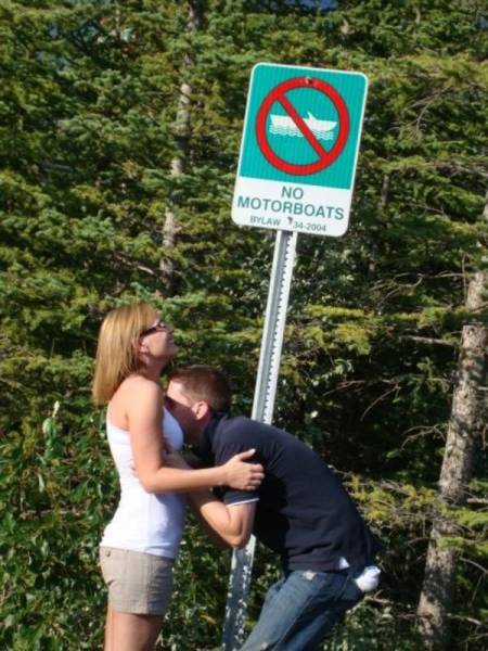 Motor-boating in front of a no motor-boating sign.