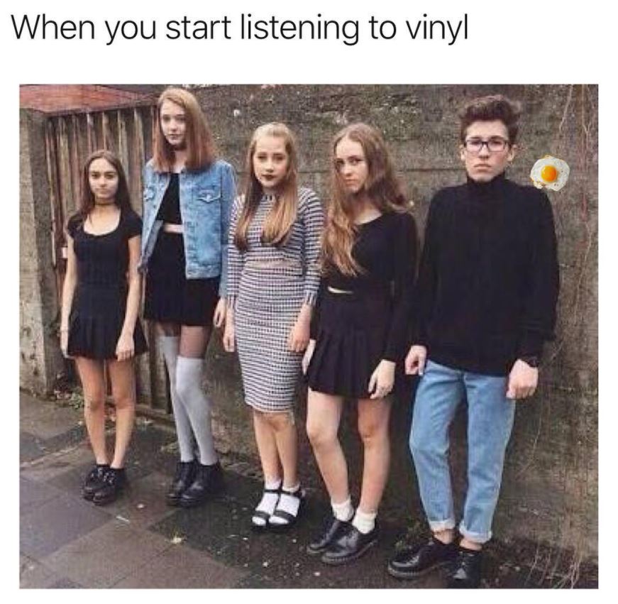 Trendy hipster looking kids with joke about what happens when you start listening to vinyl records