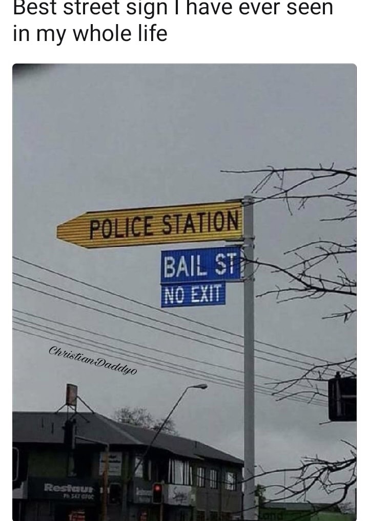 street sign of police station and bail st