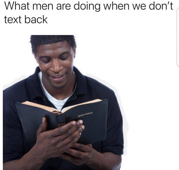 black man reading bible - What men are doing when we don't text back