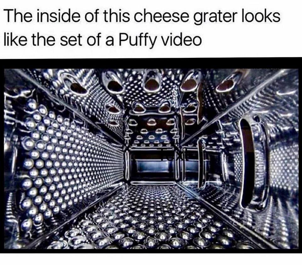 inside of a cheese grater - The inside of this cheese grater looks the set of a Puffy video 0 sed