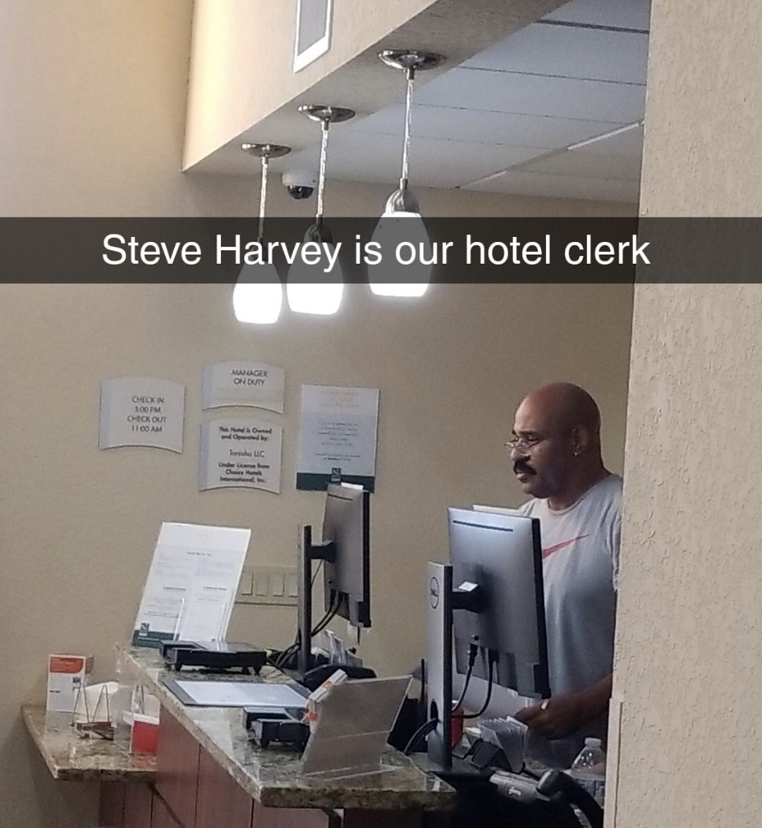 Friday TGIF meme with pic of hotel receptionist that looks like Steve Harvey