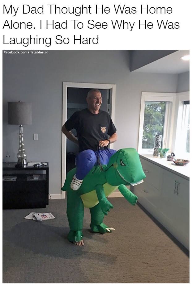Friday TGIF meme about catching dad trying on a dinosaur riding costume