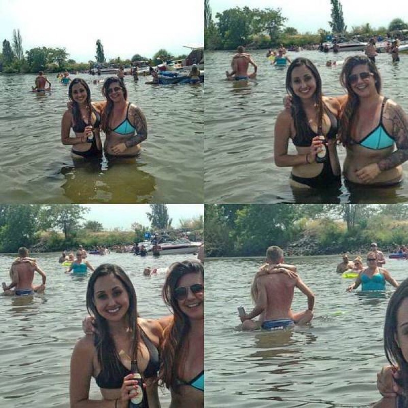 funny picture of girls in the water with couple in the background doing some compromising positions