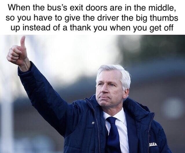 photo caption - When the bus's exit doors are in the middle, so you have to give the driver the big thumbs up instead of a thank you when you get off Lien