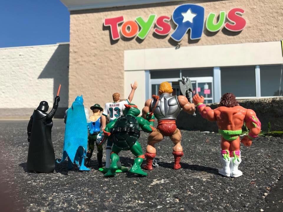 Action figures waving good by to Toys R Us