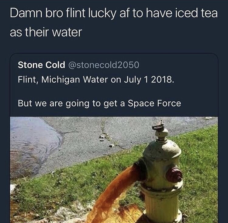fire hydrant in Flint MI spewing out brownish water with caption joking that they have Iced Tea