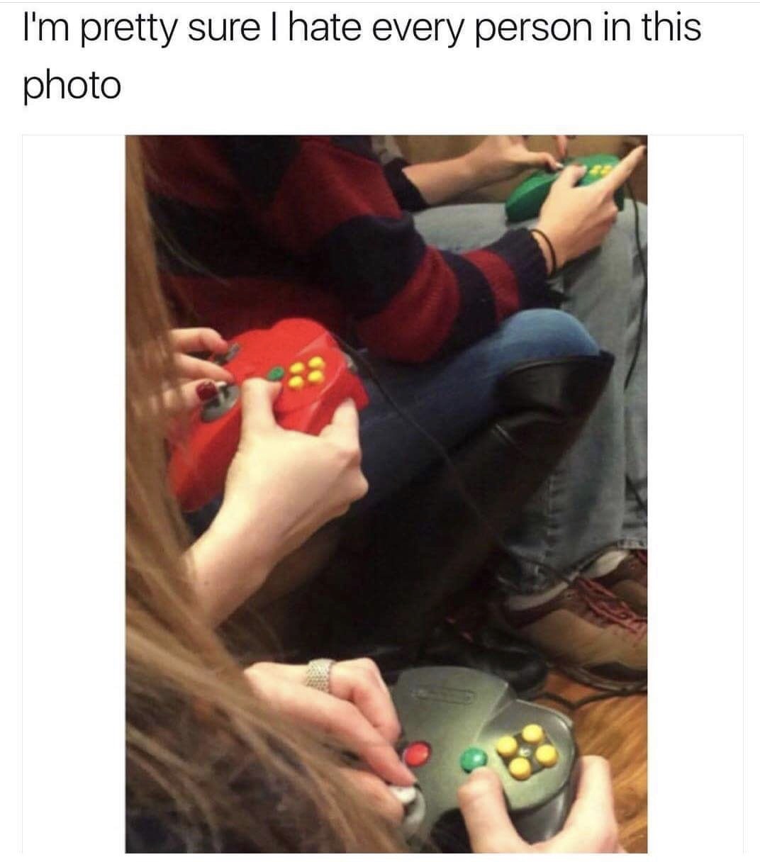 memes - people using n64 controller wrong - I'm pretty sure I hate every person in this photo