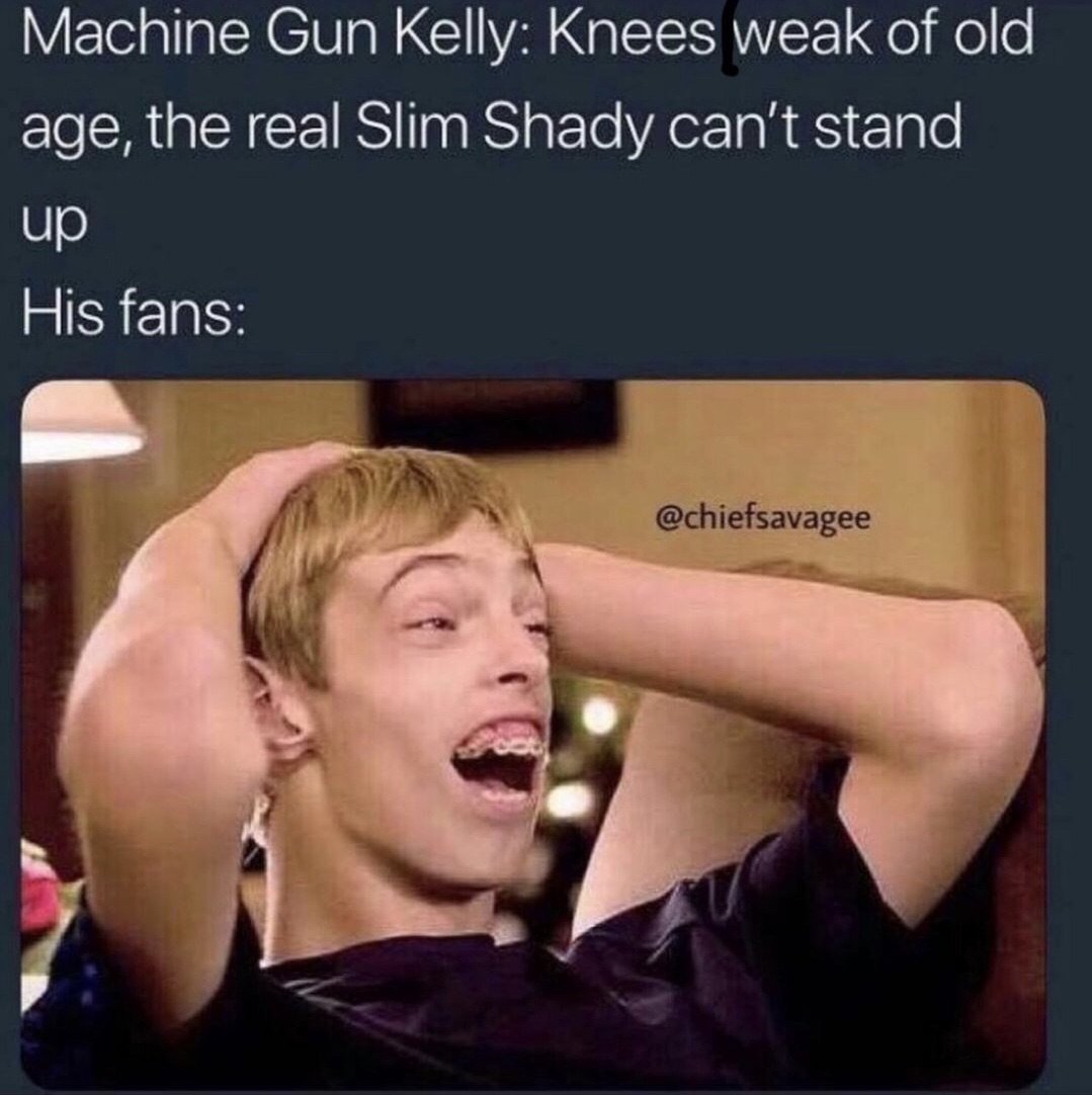 photo caption - Machine Gun Kelly Knees weak of old age, the real Slim Shady can't stand Cu up His fans