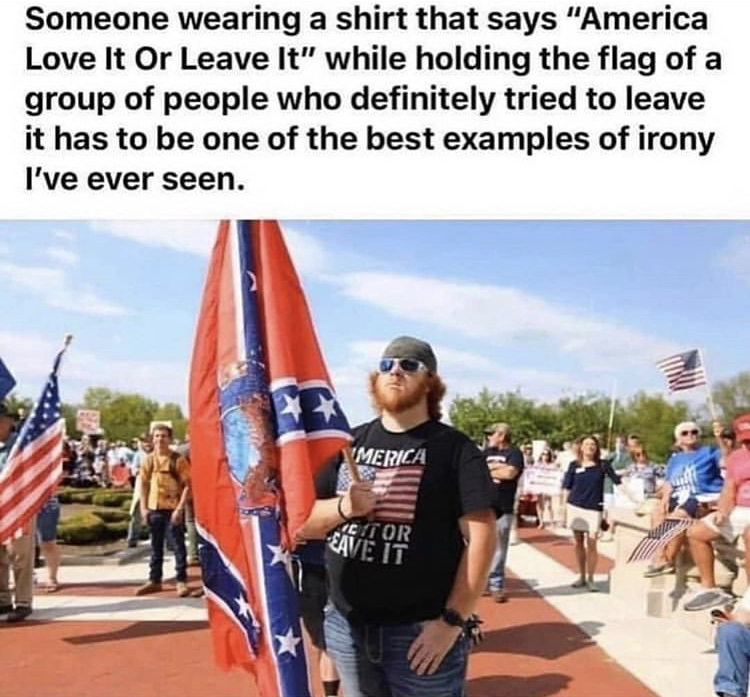 kentucky freedom rally - Someone wearing a shirt that says "America Love It Or Leave It" while holding the flag of a group of people who definitely tried to leave it has to be one of the best examples of irony I've ever seen. Merica Stor Eave It