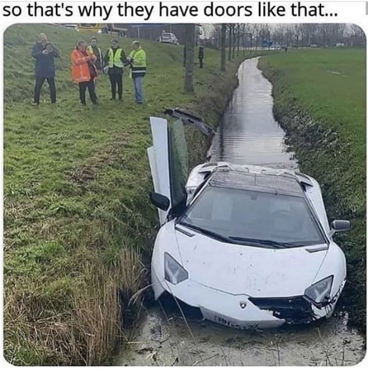 Lamborghini Aventador - so that's why they have doors that...
