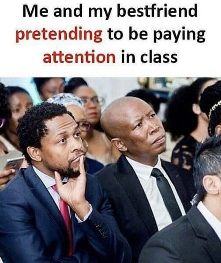 photo caption - Me and my bestfriend pretending to be paying attention in class