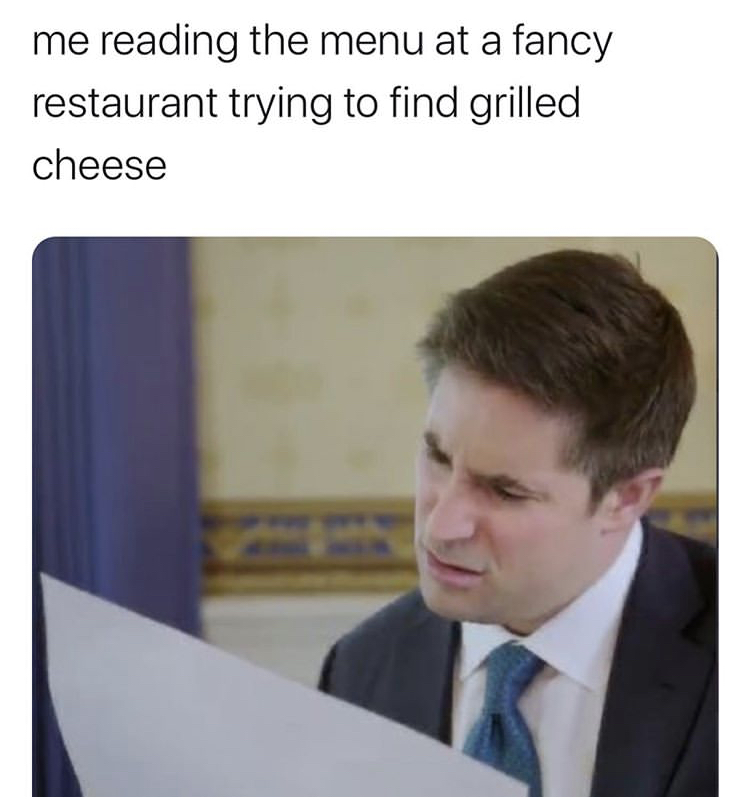 Jonathan Swan - me reading the menu at a fancy restaurant trying to find grilled cheese