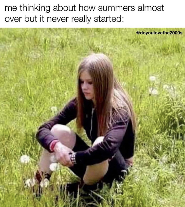 avril lavigne sitting in grass - me thinking about how summers almost over but it never really started