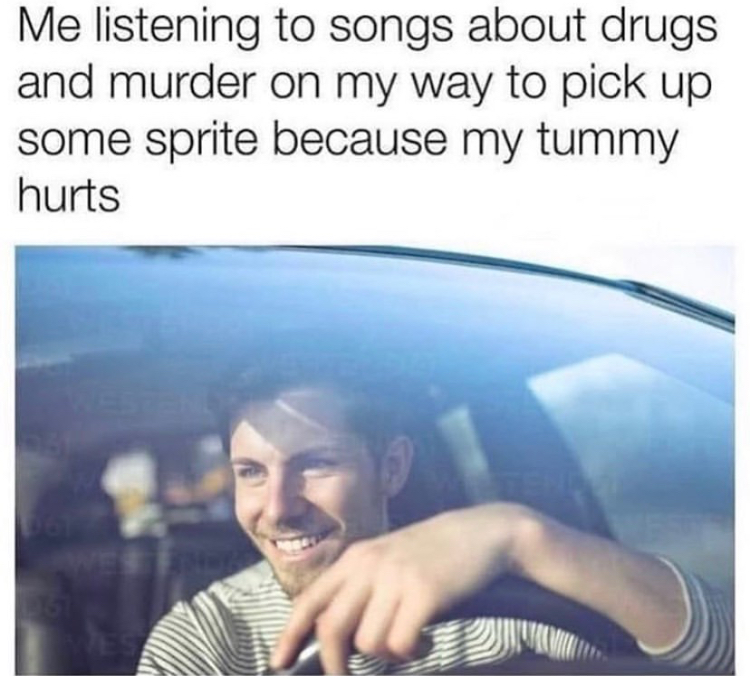 smiling man driving - Me listening to songs about drugs and murder on my way to pick up some sprite because my tummy hurts