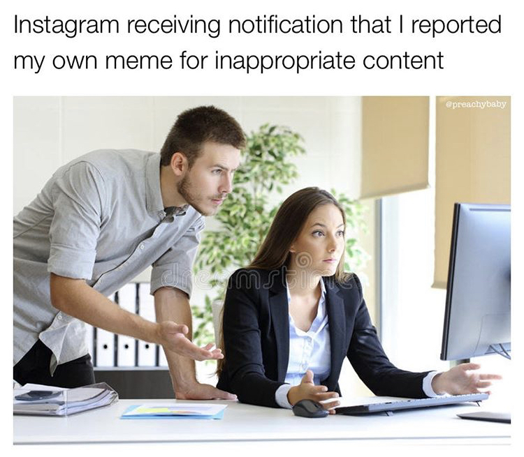 two people looking at a computer - Instagram receiving notification that I reported my own meme for inappropriate content
