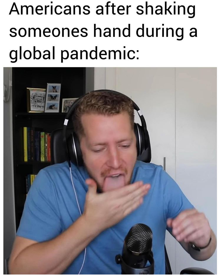 photo caption - Americans after shaking someones hand during a global pandemic