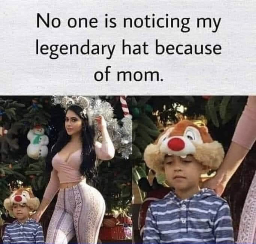 photo caption - No one is noticing my legendary hat because of mom.