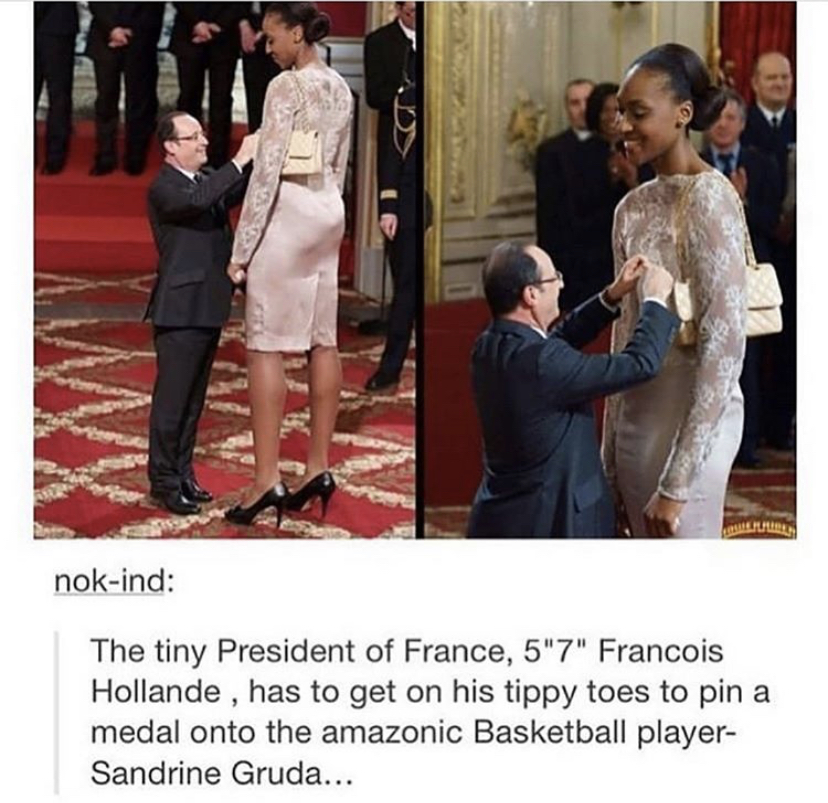 francois hollande giving medal to basketball player - nokind The tiny President of France, 5"7" Francois Hollande , has to get on his tippy toes to pin a medal onto the amazonic Basketball player Sandrine Gruda...