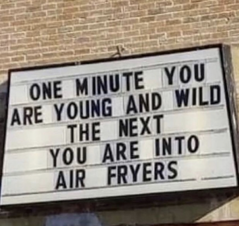 street sign - One Minute You Are Young And Wild The Next You Are Into Air Fryers