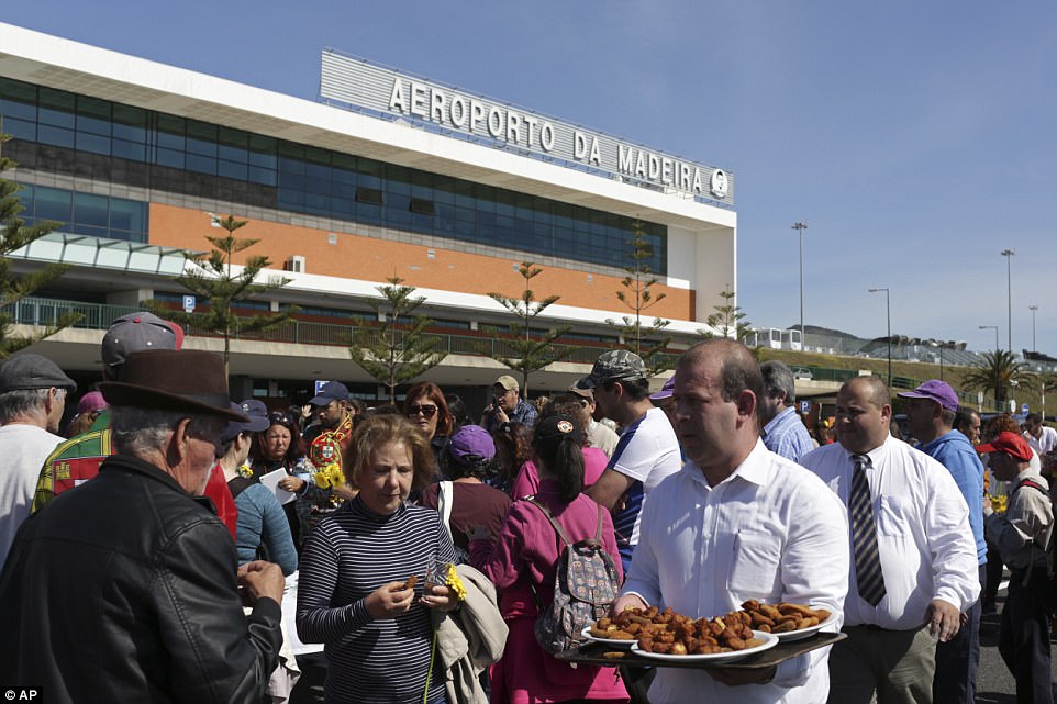 Food was brought round to feed the vast crowds who turned out in Madeira to honour hometown hero Ronaldo