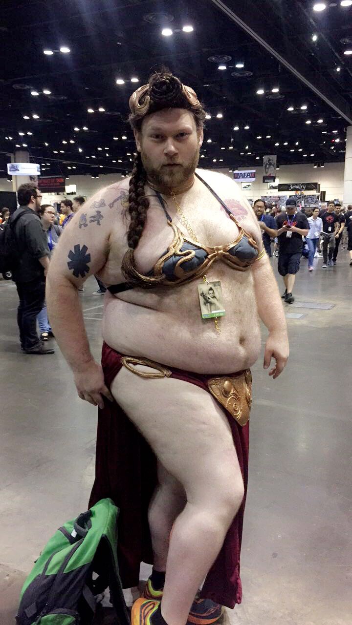 large burly man dressed as cosplay of Princess Leia 