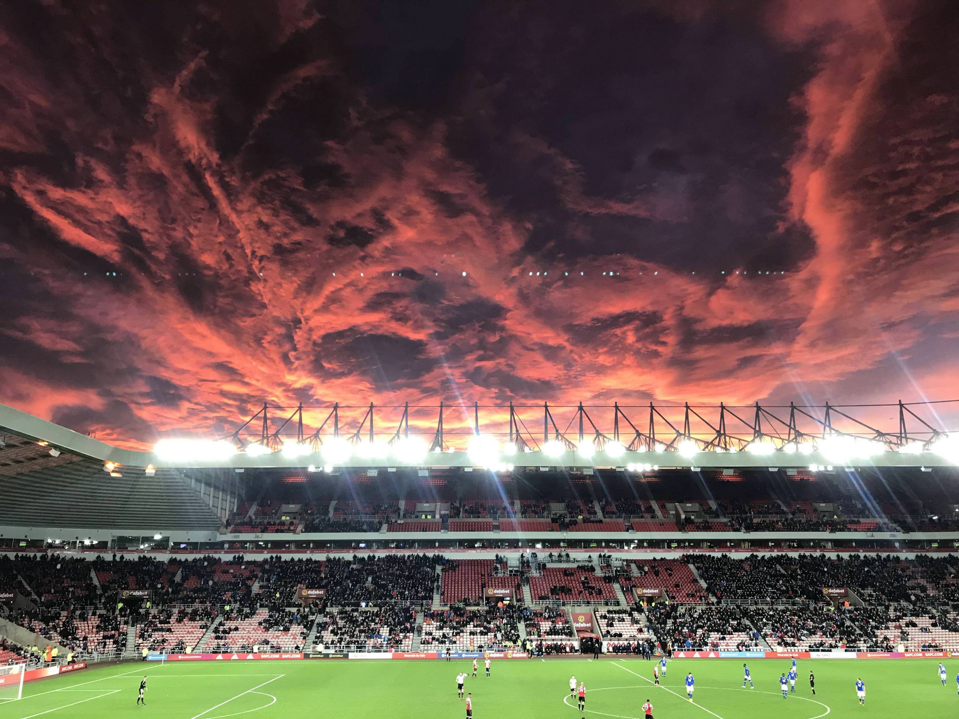 crazy sky over a soccer football statium