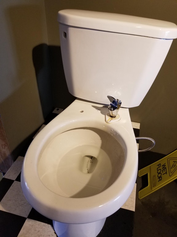 toilet with drinking fountain