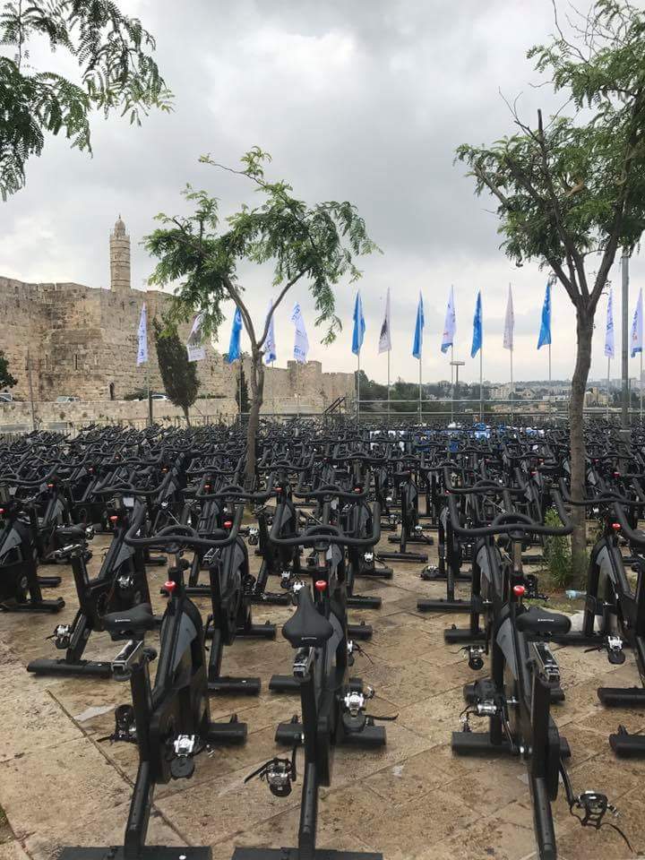 exercise bikes as far as the eye can see outside of the old city of Jeruslame