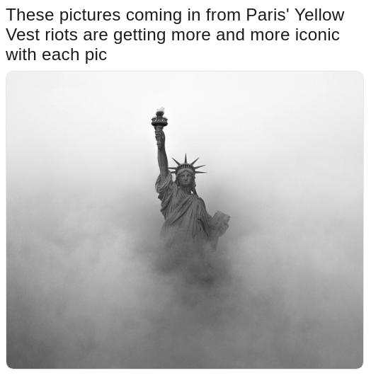 tweet of a foggy statue of liberty joking that the Yellow Vest Riots in France are starting to look really iconic