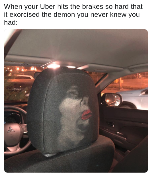 pic of a car seat headrest with an imprint of a face after a person wearing makeup slammed into it