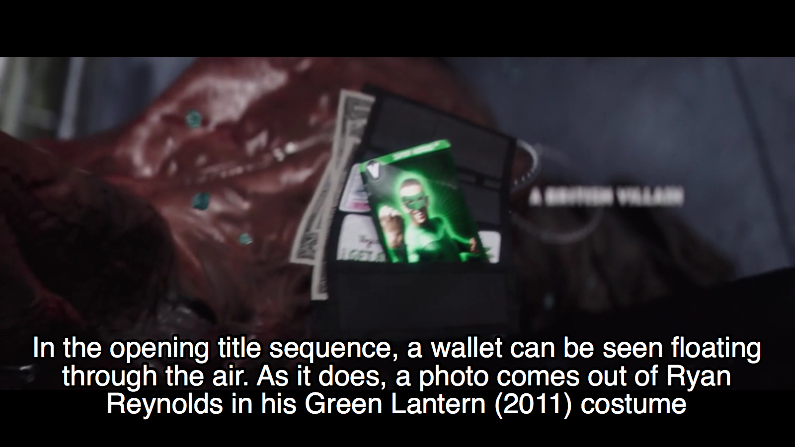 deadpool green lantern picture from wallet - In the opening title sequence, a wallet can be seen floating through the air. As it does, a photo comes out of Ryan Reynolds in his Green Lantern 2011 costume