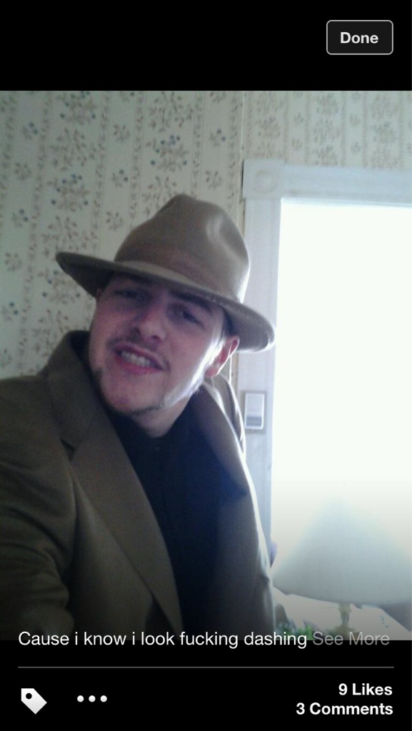 Cringe selfie with fedora who thinks he is a gangster.