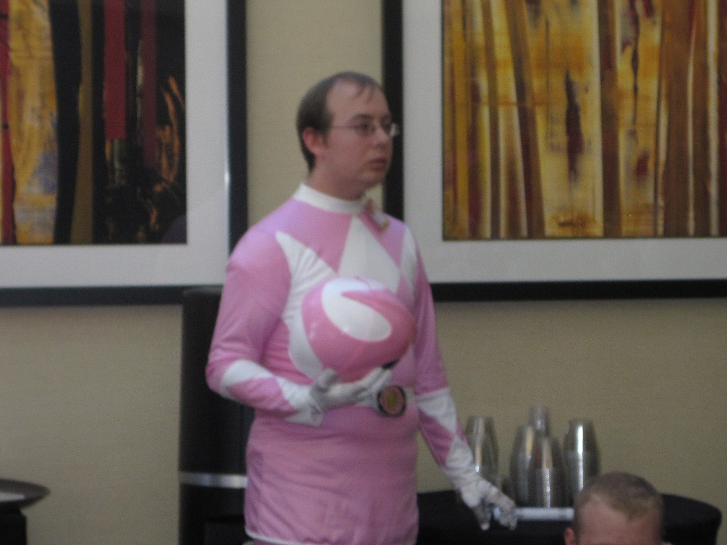 Sweaty white dude dressed as Pink Powerranger.