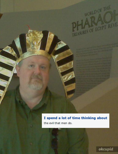 Man wearing a Pharaoh hat contemplating the evil things men do.