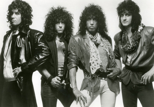 Kiss. Yep. That was Kiss in the 80s. I actually loved the "Lick It Up" album. Die hard Kiss fans would puke if they heard that.