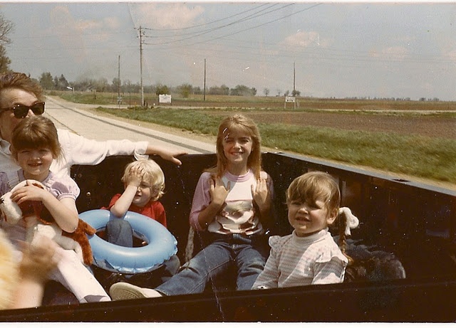 old school cool riding in the back of a pickup