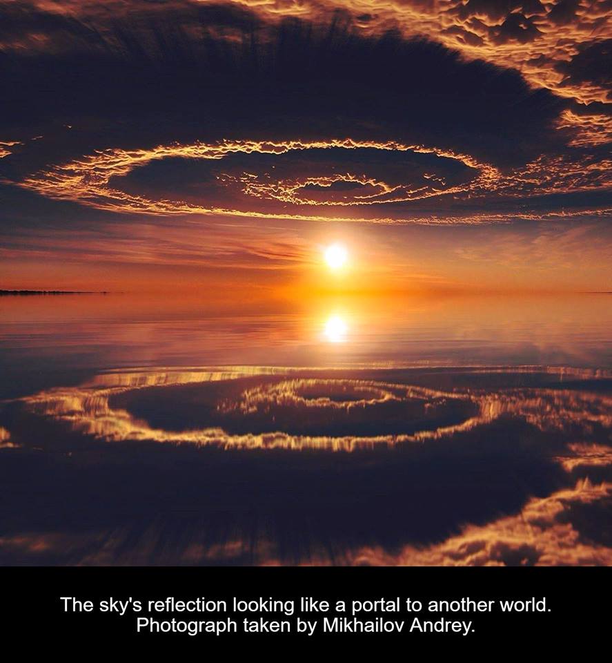 portal to another world sky - The sky's reflection looking a portal to another world. Photograph taken by Mikhailov Andrey.