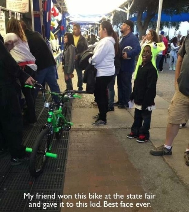 goodness in the world - My friend won this bike at the state fair and gave it to this kid. Best face ever.